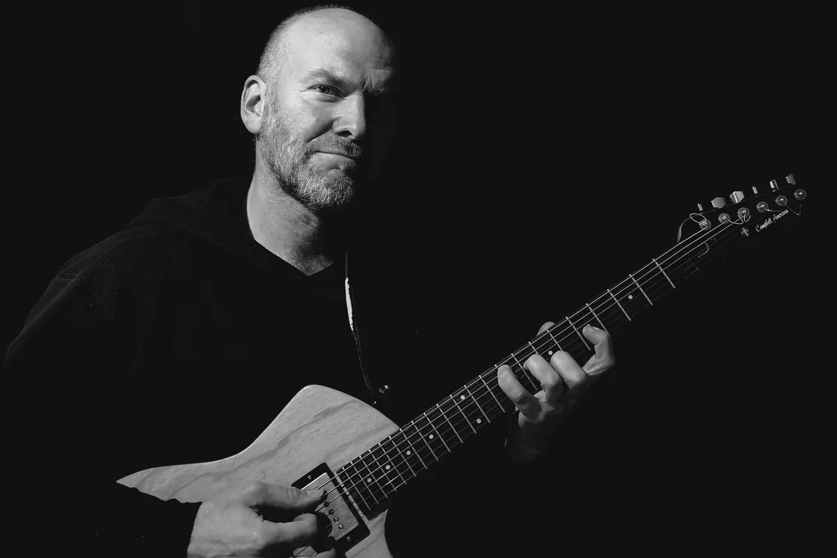 Sylvain Picard playing electric guitar